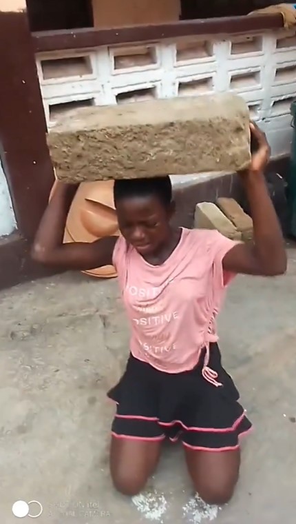 "African parents never disappoint" - Moment Ghanaian mother subject her daughter to severe punishment (WATCH)