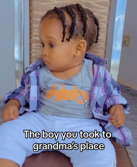 "Tegwolo, is that you?" – Netizens reacts to video of a baby whose grandmother gave a clean cut, 'gorimapa' style (VIDEO)