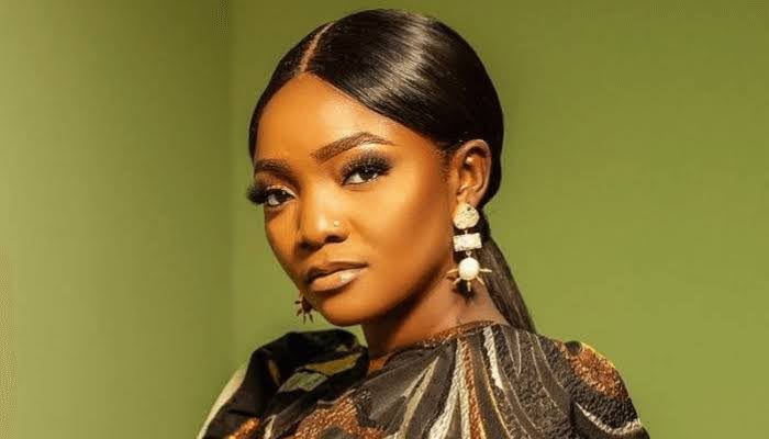 Singer Simi Criticizes Police for Counselling Man Arrested for Posting Daughter’s Naked Pictures Online