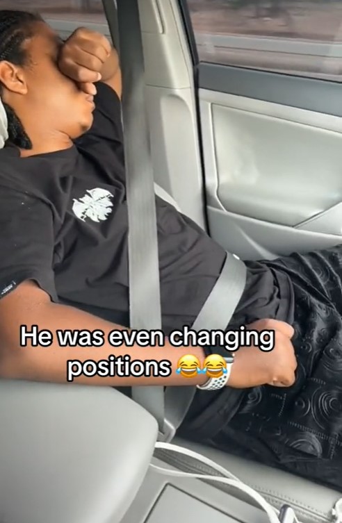 "His trust is in the seat belt" – Lady jubilates as her boyfriend sleeps off while she is driving on the highway (VIDEO)