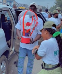 Female Corper Jubilates As Her Man And Dog Welcome Her After 3 Weeks In NYSC Orientation Camp (VIDEO)