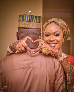 A Nigerian Lady Causes Speculation Among Netizens After Covering The Face Of Her Man In Their Pre-Wedding Photos (IMAGES)