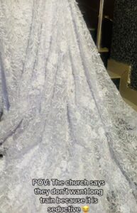 Bride reduces long wedding dress train after her church claimed it was s3ductive (VIDEO)