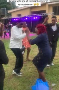 Jubilation erúpts as a female lecturer shows off dancing skills at her students' party (VIDEO)