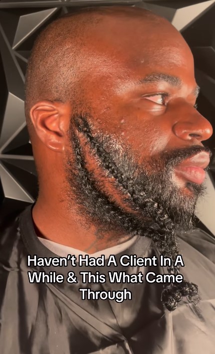 Abroad-based hairstylist shows off impressive braided beard on male client following a break in bookings (VIDEO)